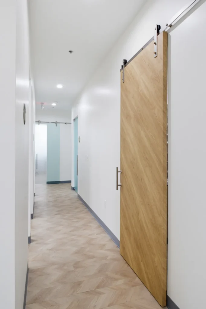 Corridor between treatment suites