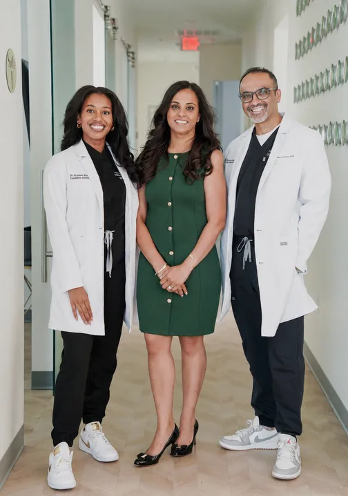 The doctors and practice manager at Dental Concepts, Irving